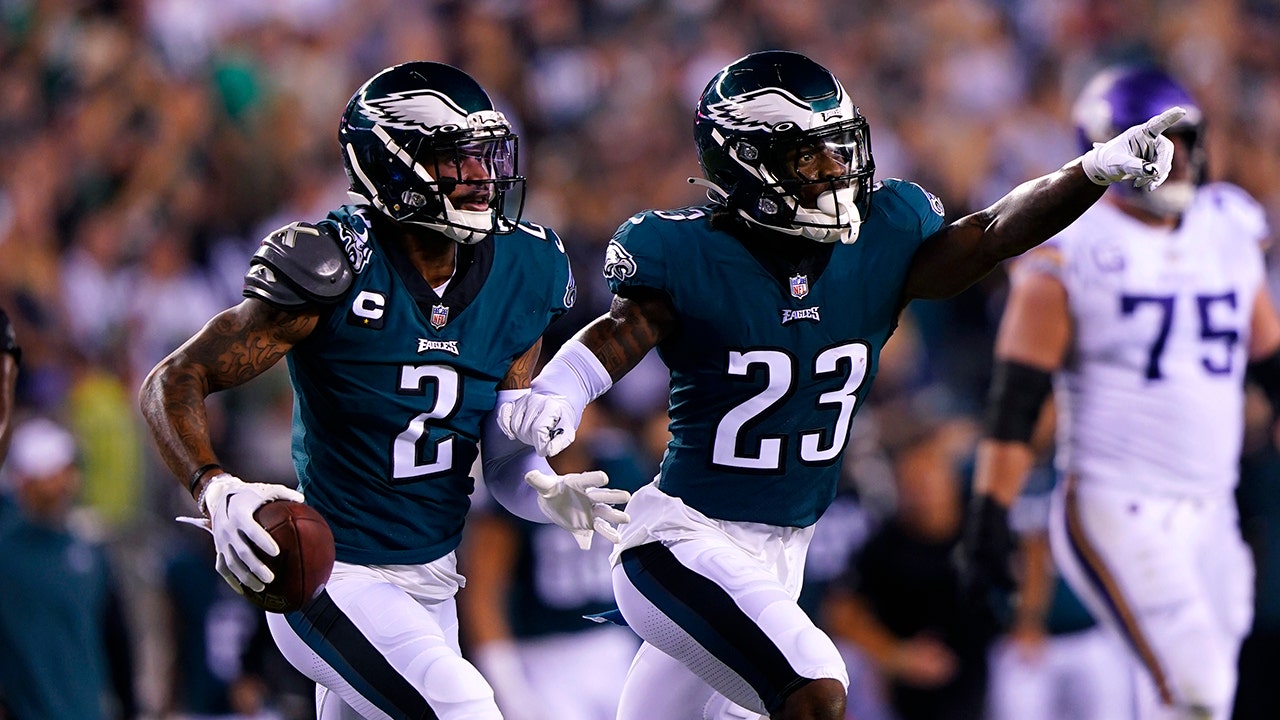 Philadelphia Eagles cornerback Darius Slay (2) celebrates with teammate safety C.J. Gardner-Johnson (23) after intercepting a pass during the second half of an NFL football game against the Minnesota Vikings, Monday, Sept. 19, 2022, in Philadelphia. 