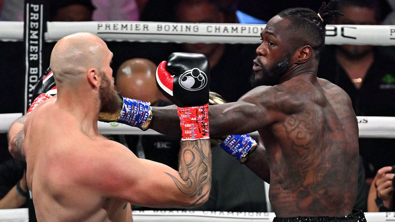 US boxer Deontay Wilder (R) fights Swedish-Finnish boxer Robert Helenius during their 12-round WBC World Heavyweight Title Eliminator fight at Barclays Center in Brooklyn, New York, on October 15, 2022.